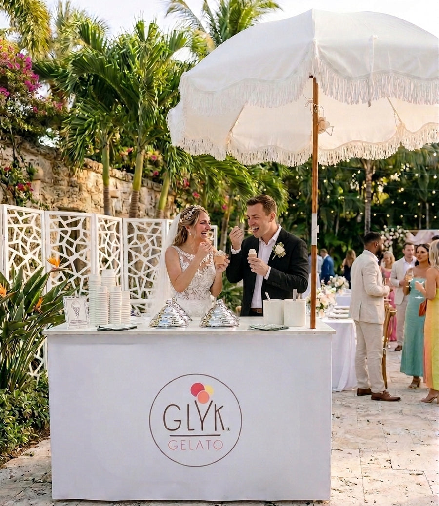Bride and groom enjoying gelato at their wedding